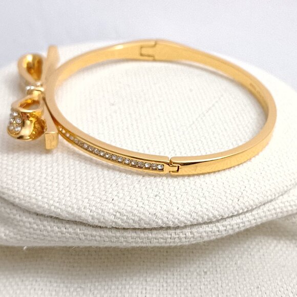 Kate Spade Love Notes Ribbon Bow Rhinestone Gold Tone Hinged Bracelet - Picture 3 of 4
